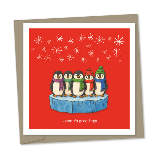 5 penguins on a block of ice